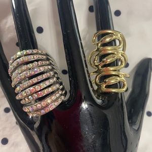 PRE OWNED!!! 2 metal rings. One gold/ One silver